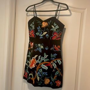 This is short cotten flower pattern dress, size L , from Selfie Leslie brand